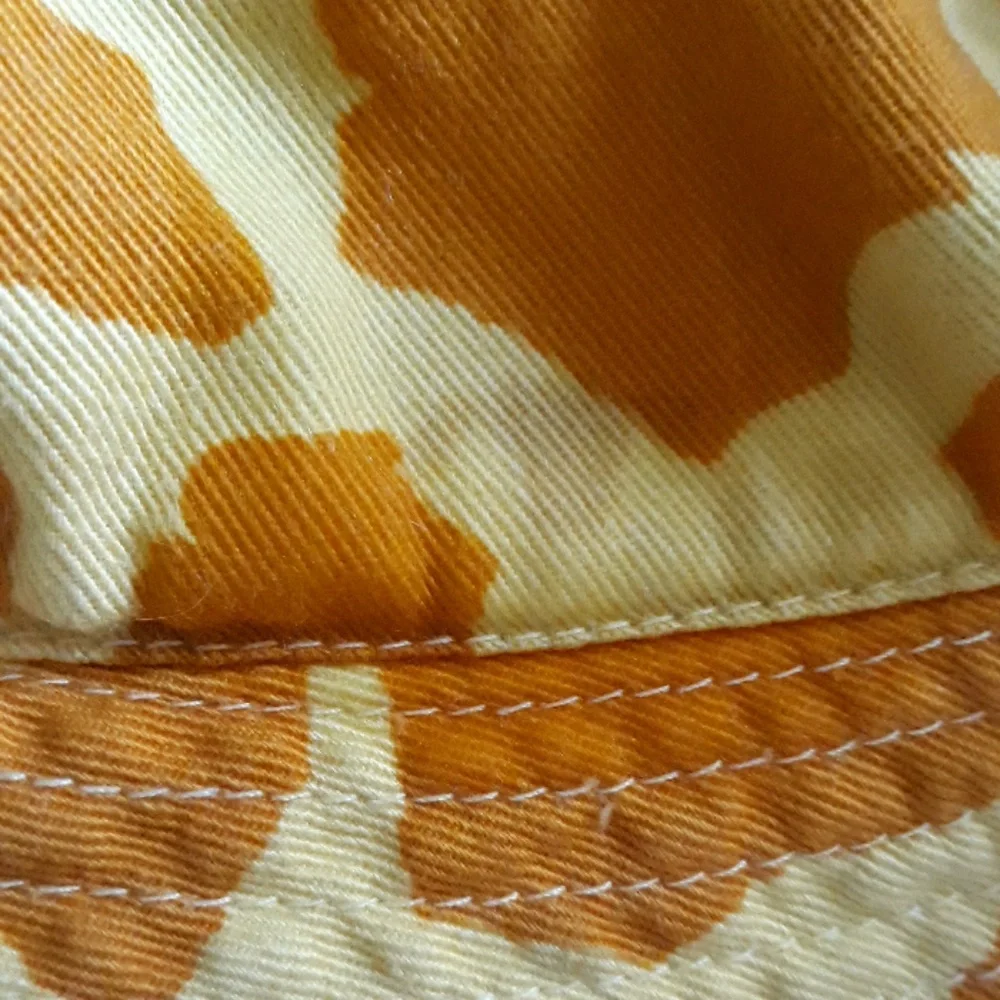 Melissa and Doug and Geoffrey the Giraffe kids hats